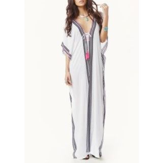 Moroccan-Inspired Embroidered Kaftan Dress for Bohemian Chic Statement.