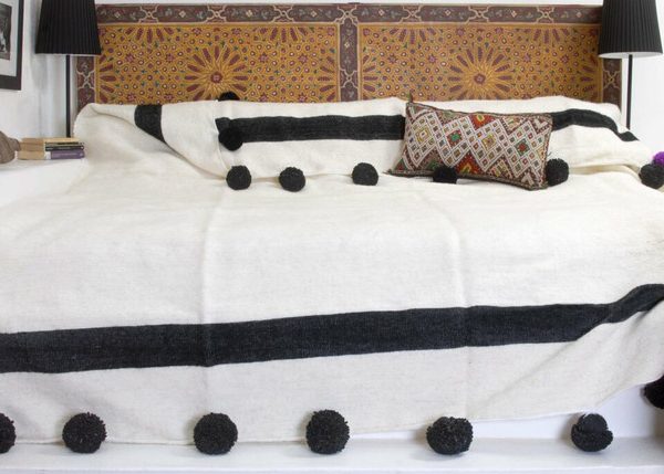 Handwoven Moroccan Cotton Blanket with Red Pom Poms