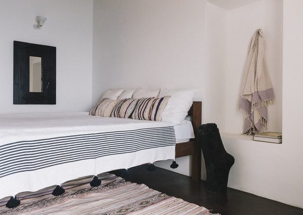 Hand-Woven Moroccan Pom Pom Blanket in White with Black Pom Poms