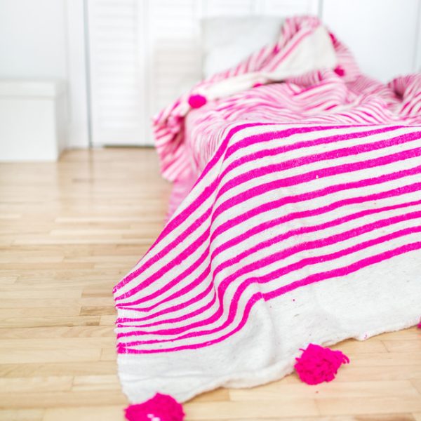 Handwoven Pink and White Striped Pom Pom Blanket