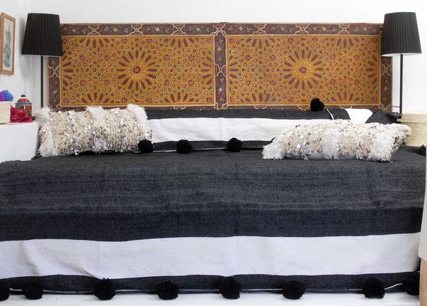 Hand-Woven Moroccan Pom Pom Blanket with Black Poms